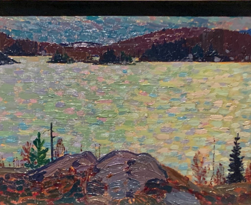 Tom Thomson painting Canoe Lake and islands. 1916