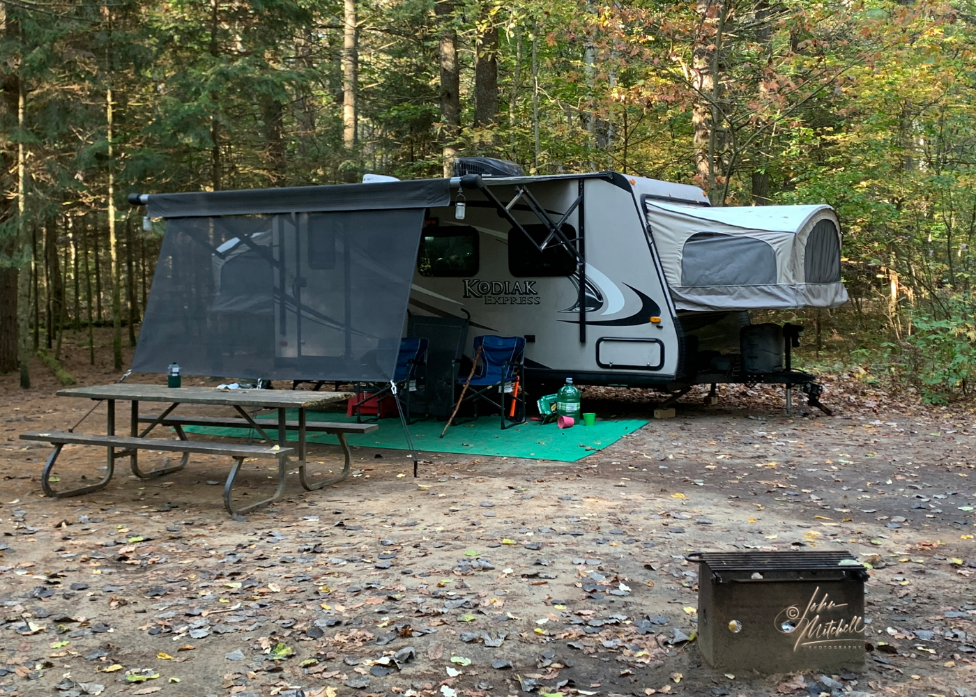 photo of trailer and campsite