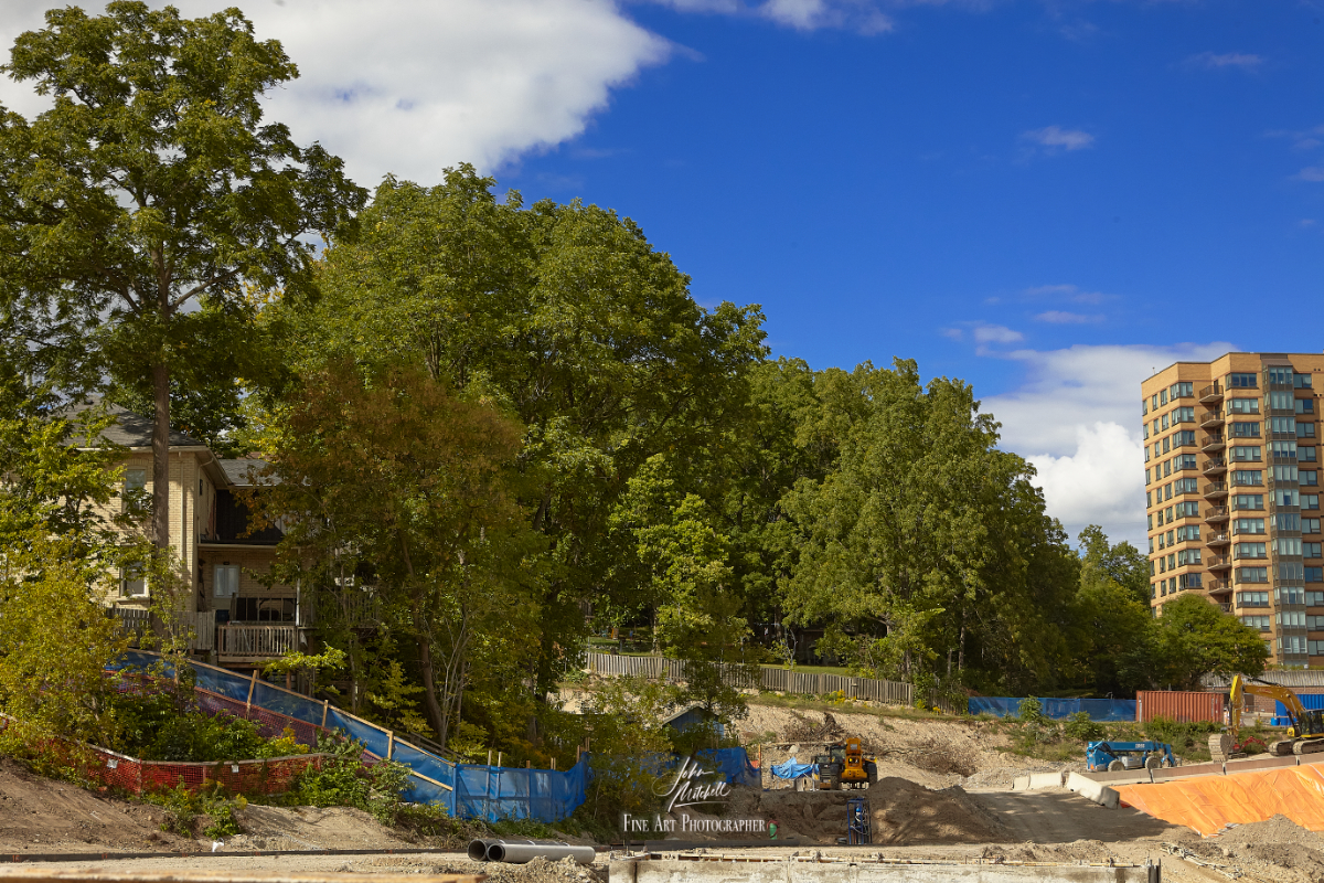 Colour photograph of the construction site on the old Kress Hotel Property showing the backyards of Fountain Street Properties.